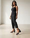 Lewista Block Heels (Black), worn or held by model