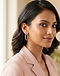 Lewista Hoop Earrings (Blush), worn or held by model