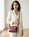 Lewista Crossbody Bag (Burgundy), worn or held by model