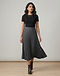 Lewista Pleated Skirt (Charcoal), worn or held by model