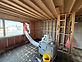 Room stripped to studs with air scrubber during abatement