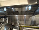 Cleaned stainless steel commercial kitchen hood
