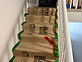 Staircase covered with protective board during work