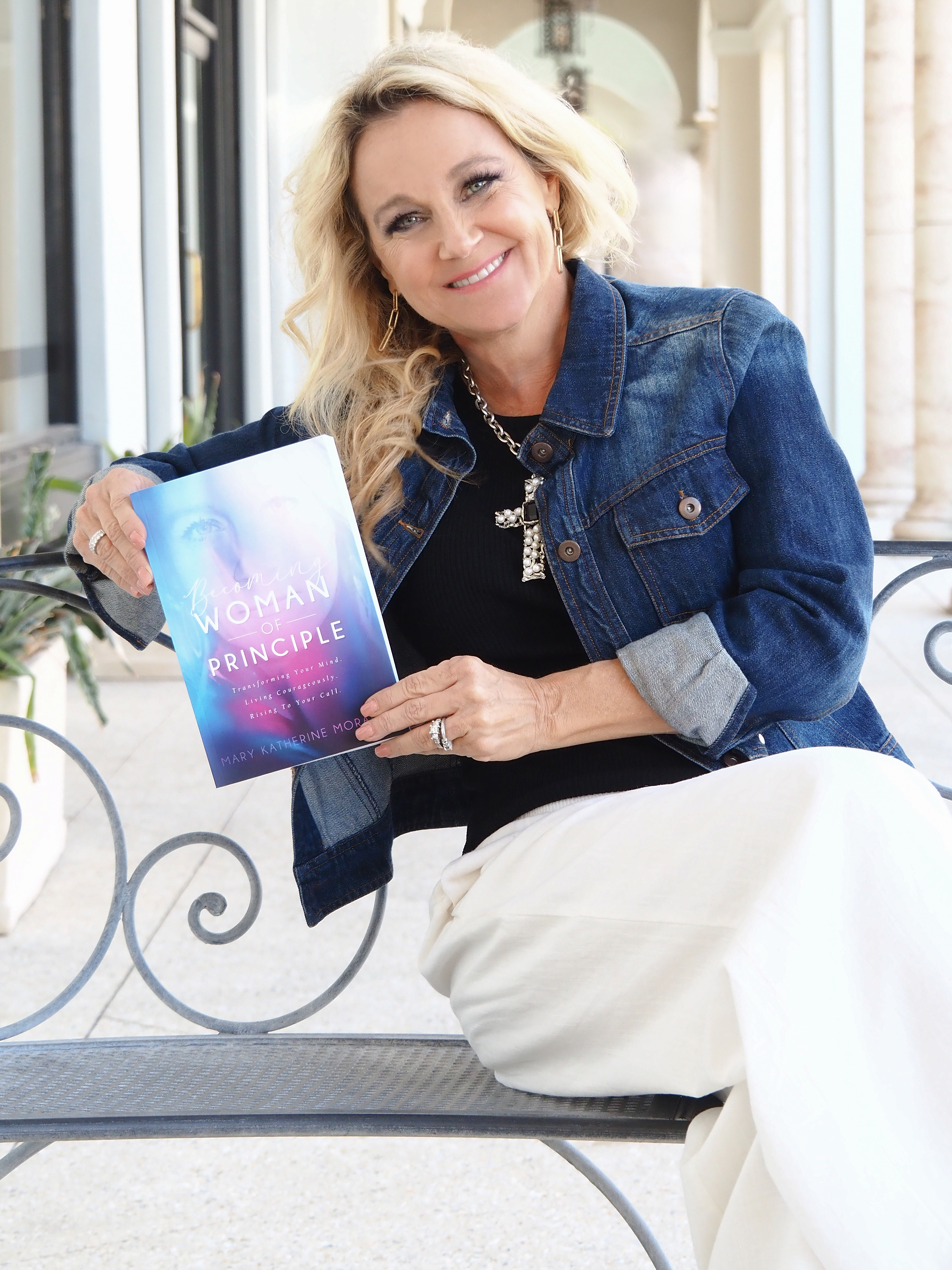MK holding her book