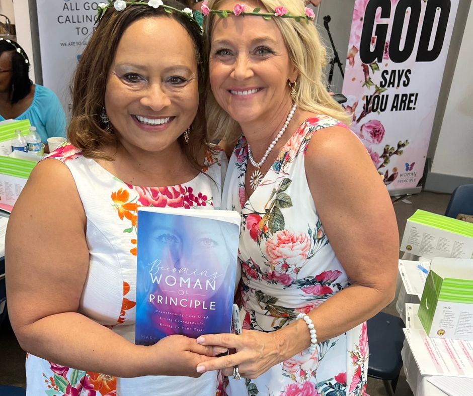 MK with a reader holding the book