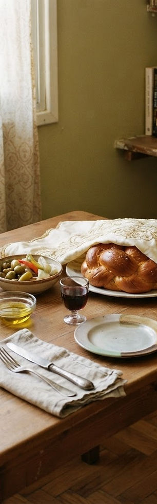 A Shabbat table being set in a home