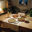 A vegetarian Shabbat table with dishes to share