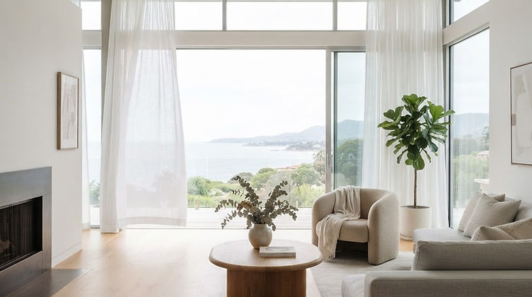 Minimalist living room with sheer curtains and gentle breeze