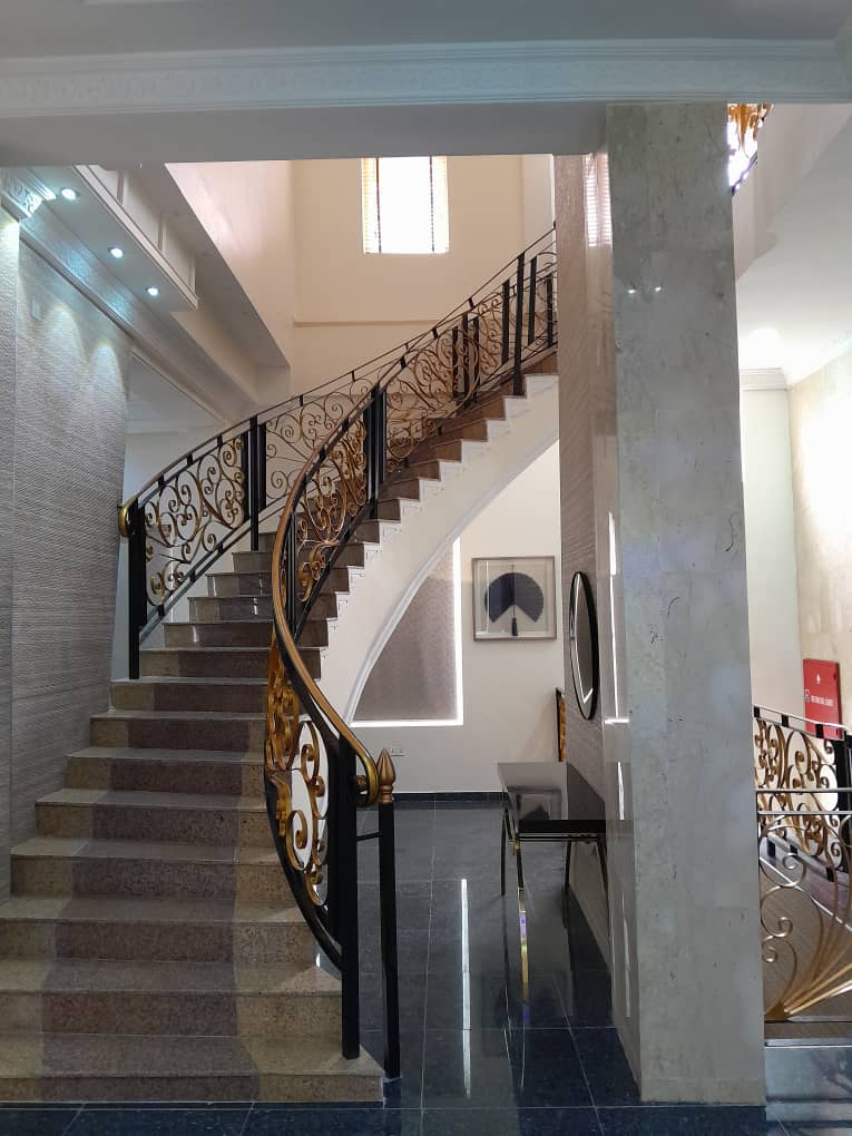 The curved staircase at Citi Residence