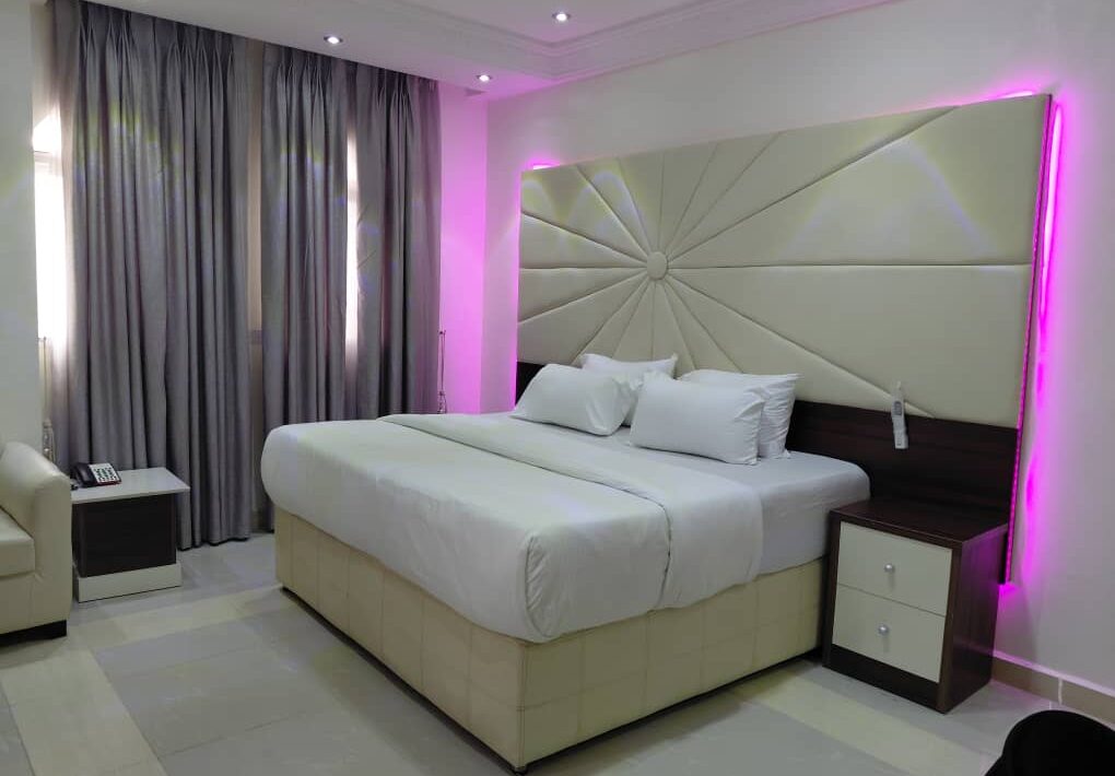 The Penthouse Suite with its sunburst headboard and feature lighting