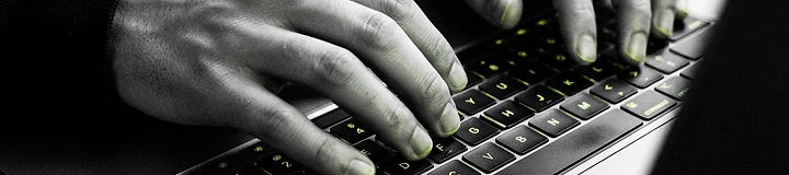 Hands over a keyboard