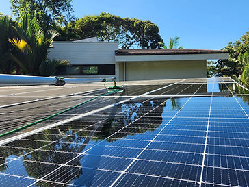 Rooftop solar panel cleaning