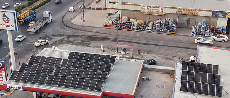 Solar panels installed on a petrol-station roof.