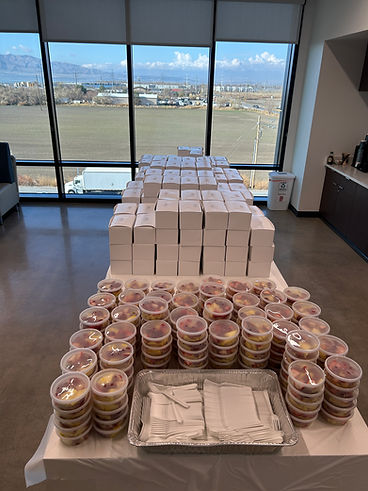 Boxed lunches and fruit cups with a view of Utah County