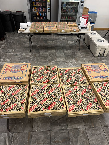 Pizza boxes ready for an office delivery