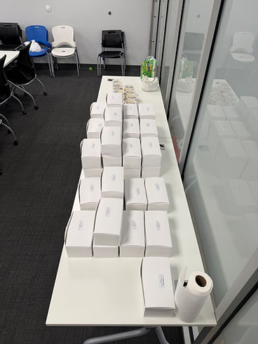 Individual boxed lunches laid out for a corporate lunch