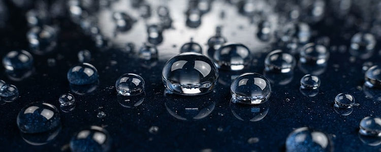 Water beading into perfect spheres on a ceramic-coated surface