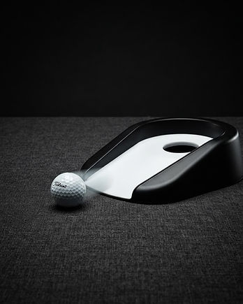 Auto-Return Putting Cup