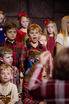 Young GCA students singing at the Christmas program