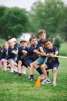 GCA students pulling together in a game of tug of war