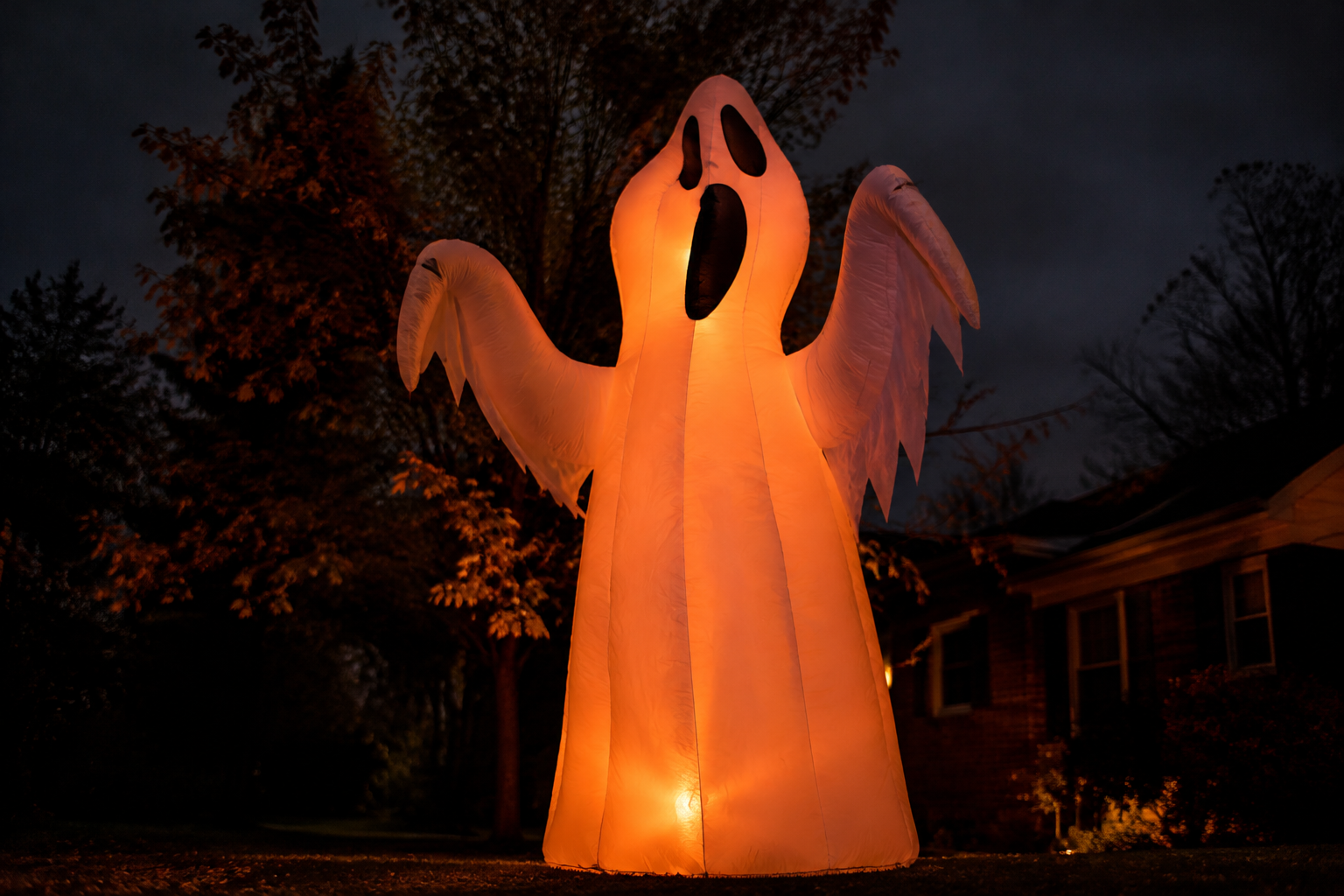30. Inflatable Ghost Yard Display - backyard Halloween party idea