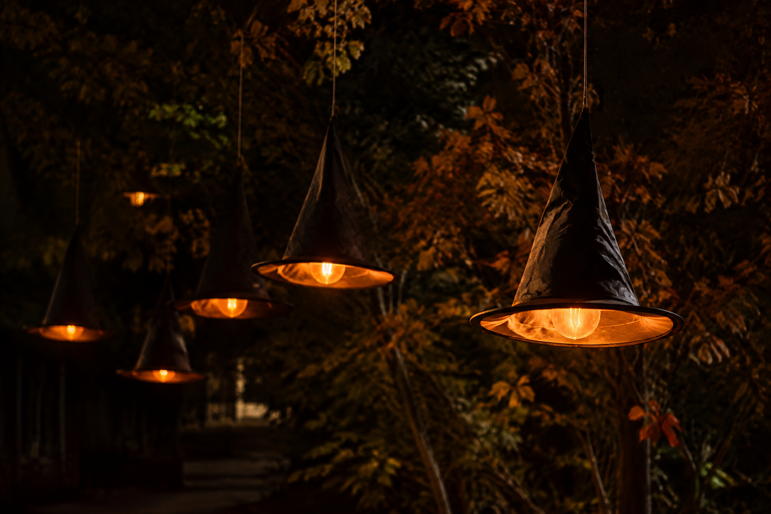 2. Floating Witch Hat Luminaries - backyard Halloween party idea