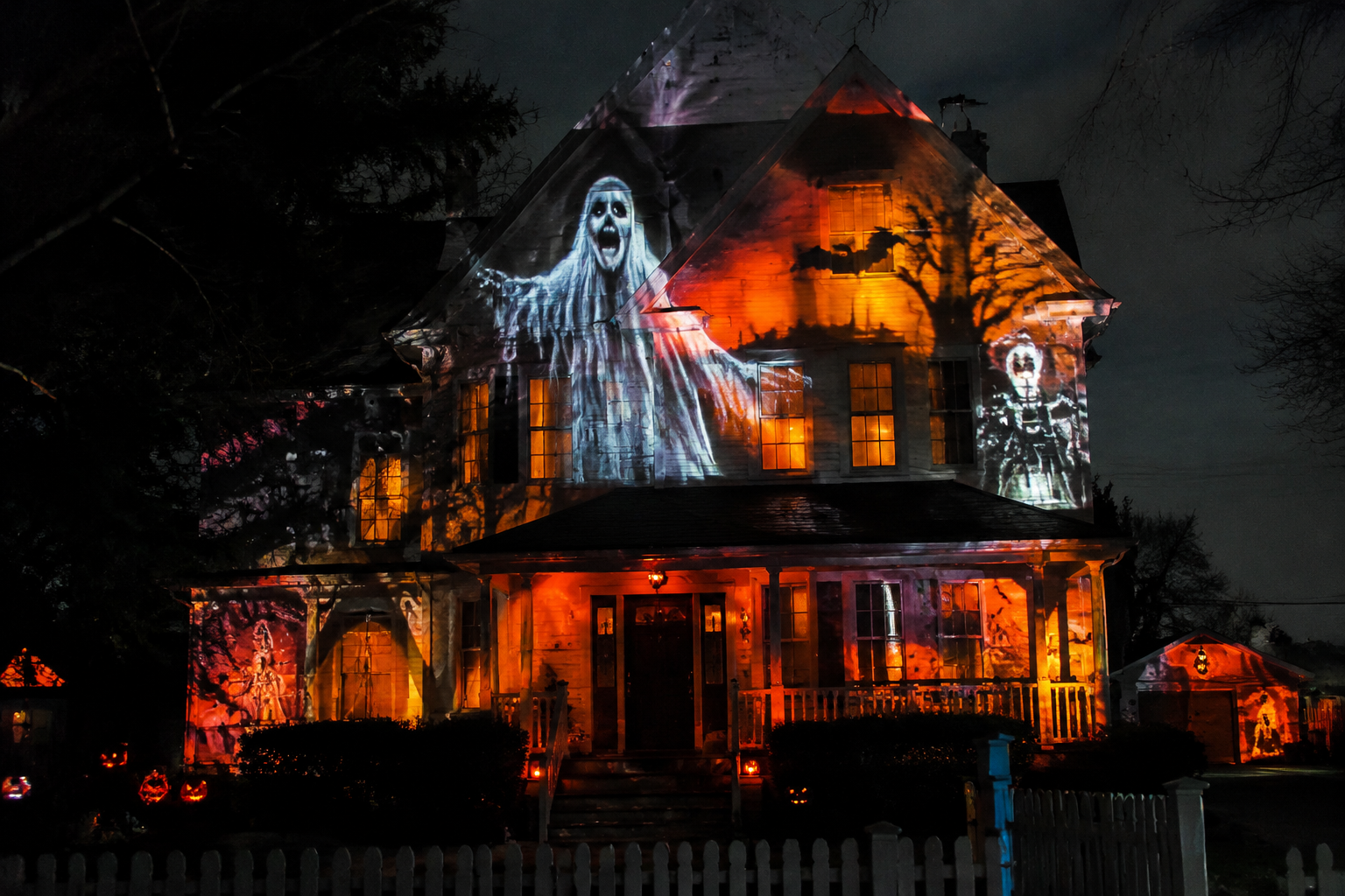 32. Halloween Projection Mapping - backyard Halloween party idea