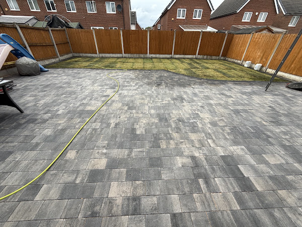 Tegula block paving and newly turfed lawn installed by TRUE PAVE UK LTD