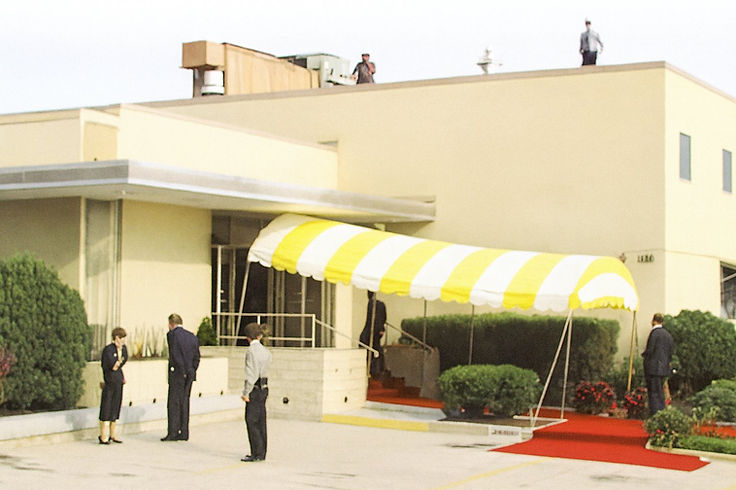 The Springfield building under its striped awning, the red carpet laid out at the entrance