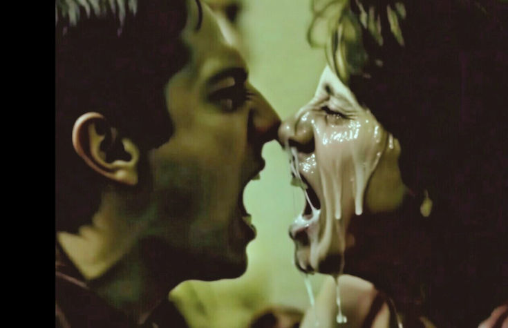 Two faces inches apart, one screaming at the other, spit running down the other face in strings
