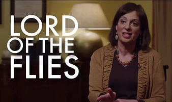 A woman speaking to camera, the words Lord of the Flies lettered across the left of the frame.