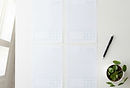 Neatly arranged printable documents on a clean desk