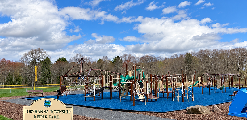Keiper Park sign in front of the large playground in Pocono Lake