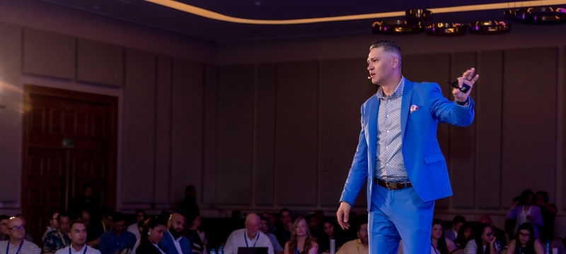 Joe Sallustio keynoting to a full conference room