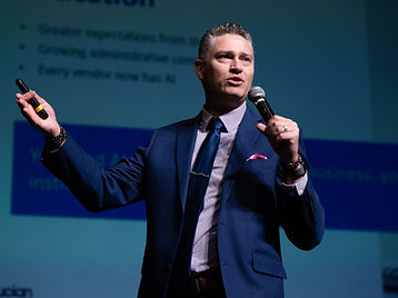 Joe Sallustio presenting an AI session on stage