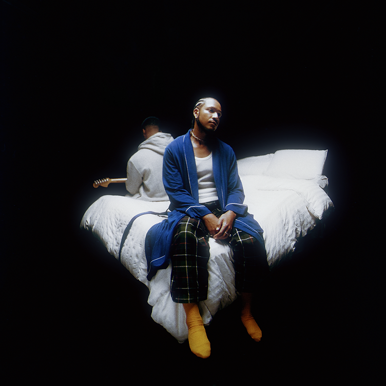 Bathe — album cover, seated on a bed