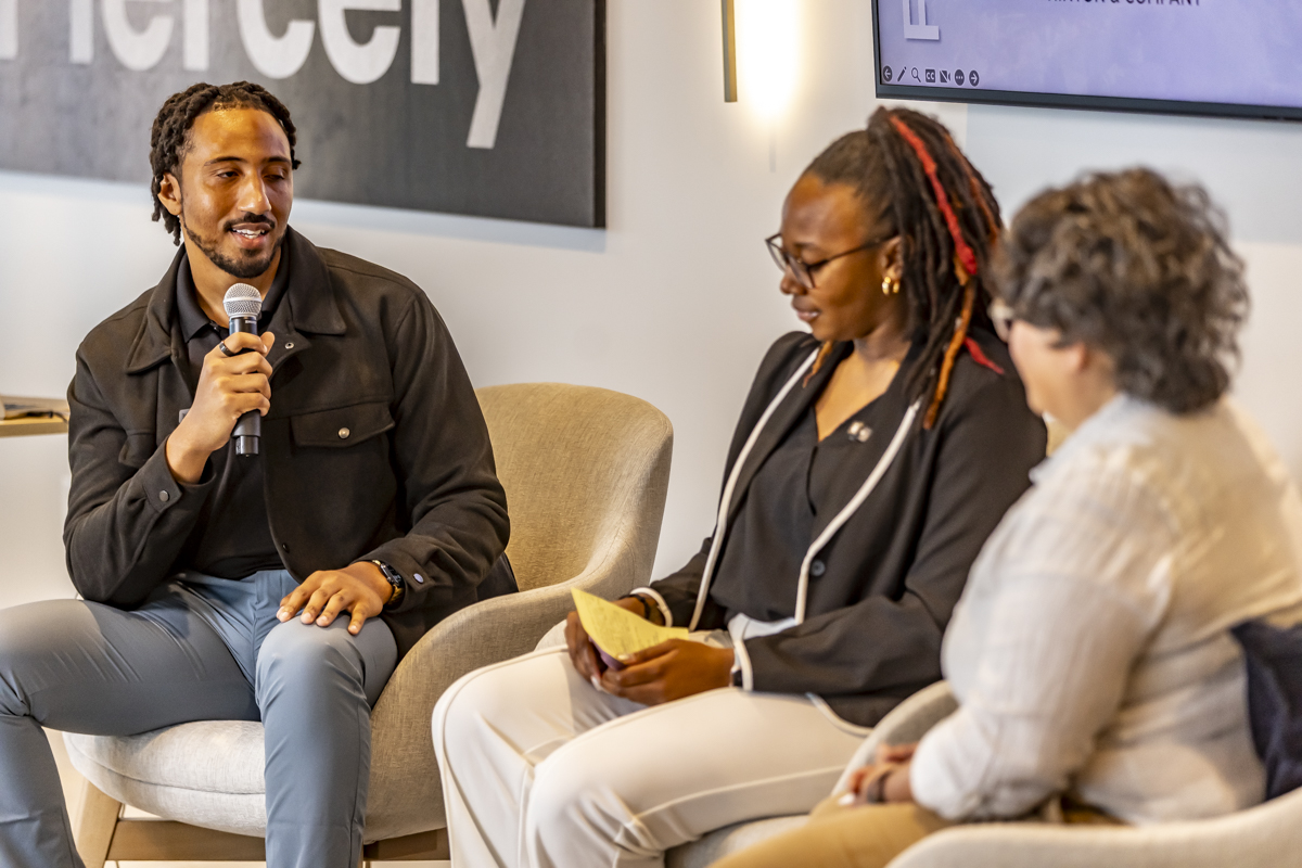 Three leaders in conversation during a Hinton & Company panel