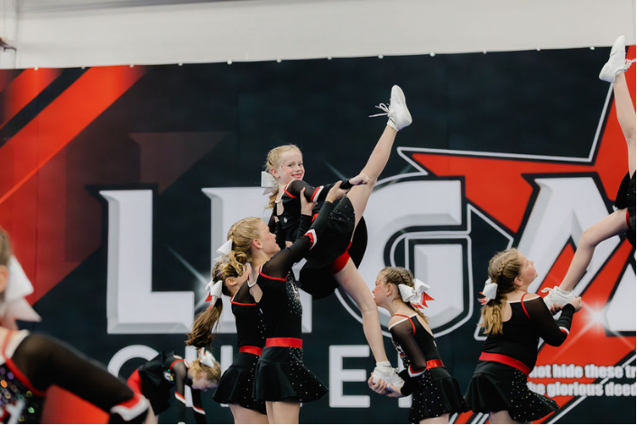 Legacy Cheer athletes competing