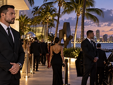 Bodyguard team covering a client arrival on the Miami waterfront at dusk