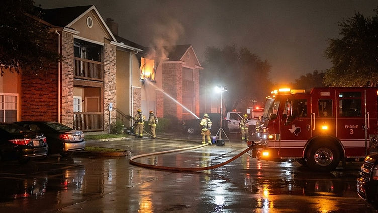 Overnight apartment fire near Loop 410 in San Antonio Texas - emergency fire watch and apartment security response