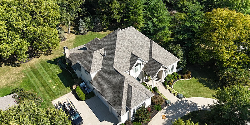 Aerial view of a newly installed asphalt shingle roof in Kentucky