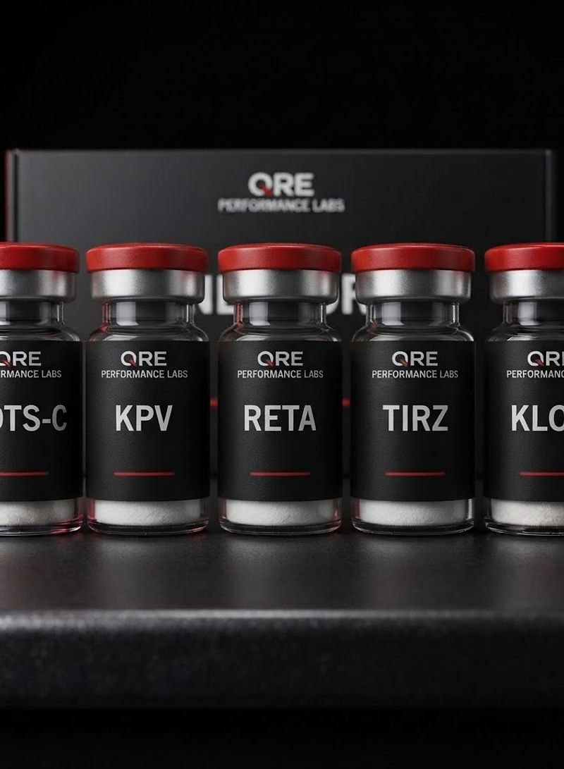 QRE research compound vials on a dark laboratory surface