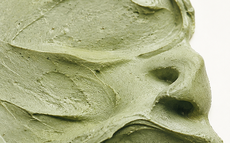 Macro photograph of a pale clay treatment texture on stone
