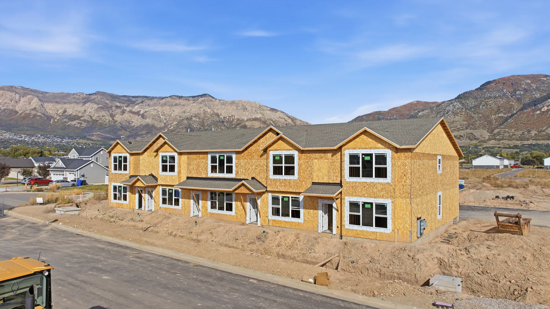 North Ogden Meadows · Front elevation of townhomes under construction