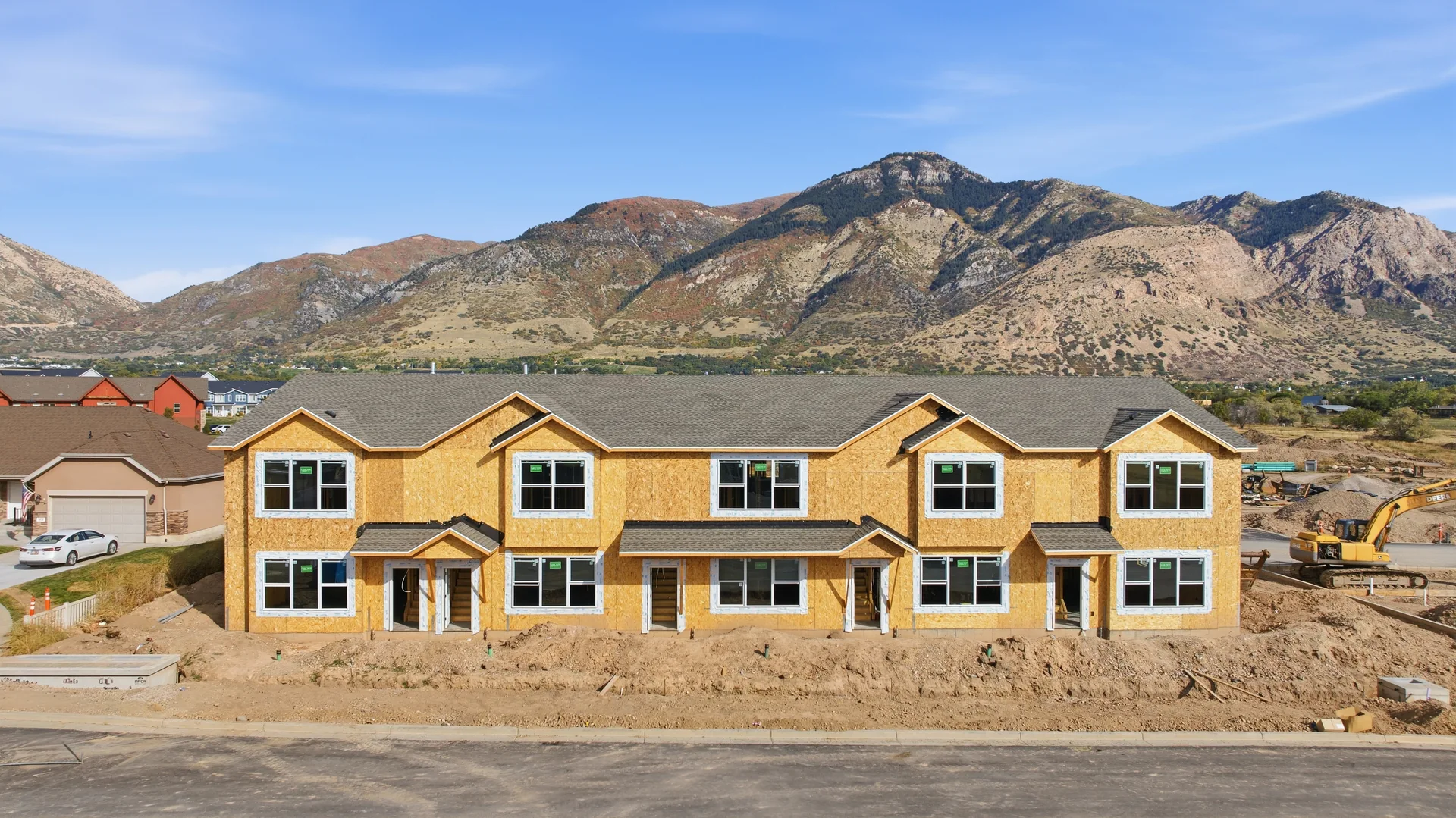 North Ogden Meadows · Townhomes under construction with mountain views
