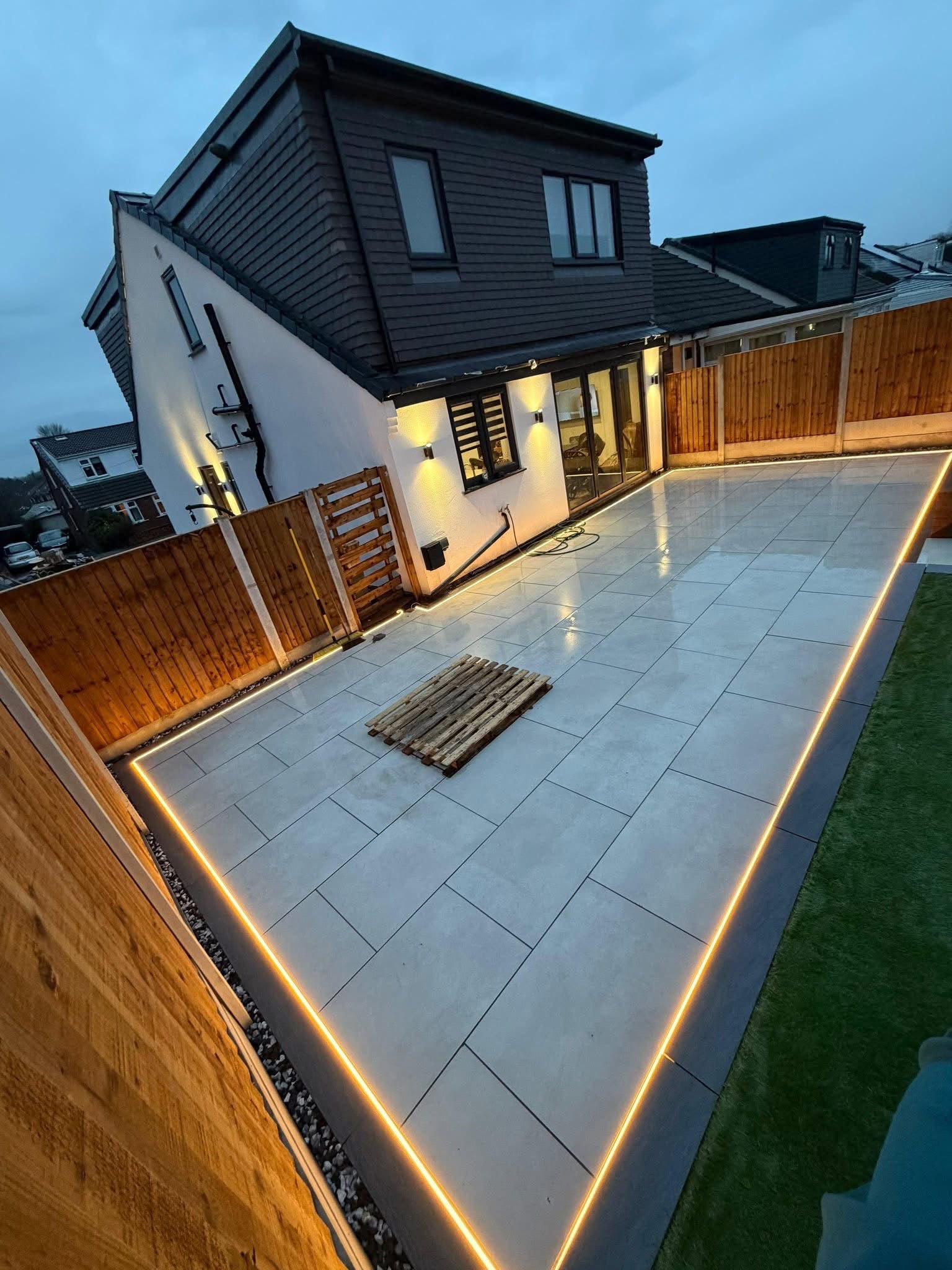 A tarmac driveway with a block-paved border finished by Elegant Landscape & Design