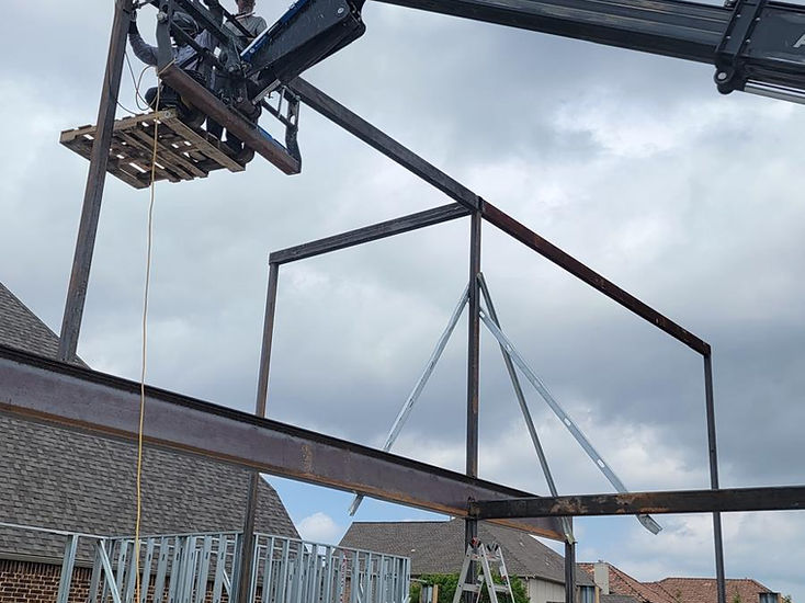 Steel frame lifted into place by RF Iron Works