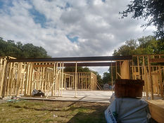 Steel beam support structure on a residential job site. Structural Steel by RF Iron Works