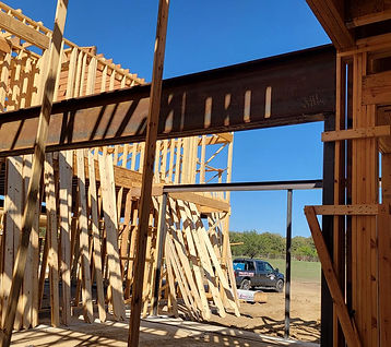 Steel beam set during framing