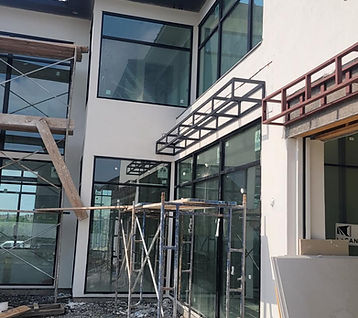 Steel awning frame on a modern home